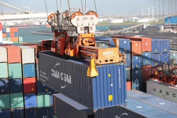 Container in a freight yard being moved